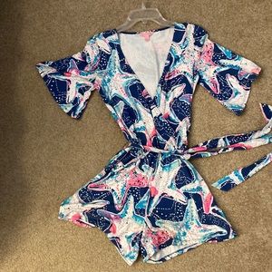 Lilly Pulitzer XS romper. Wrap front, knit fabric 3/4 batwing sleeves